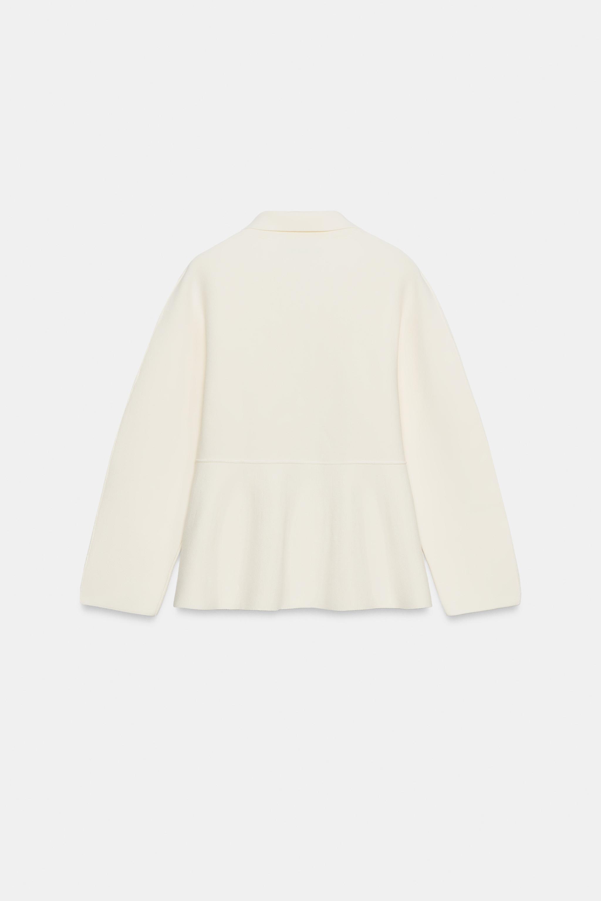 GILET EN MAILLE PEPLUM ZIPPÉ